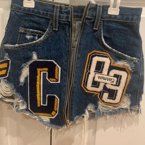 Carmar patch denim skirt